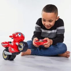 GIOCHI PREZIOSI Ricky Zoom Moto R/C Con Funzione Impennata